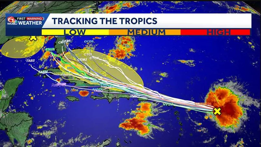 Satellite and forecast graphics tracking the remnants of Tropical Storm Dolly over the Atlantic