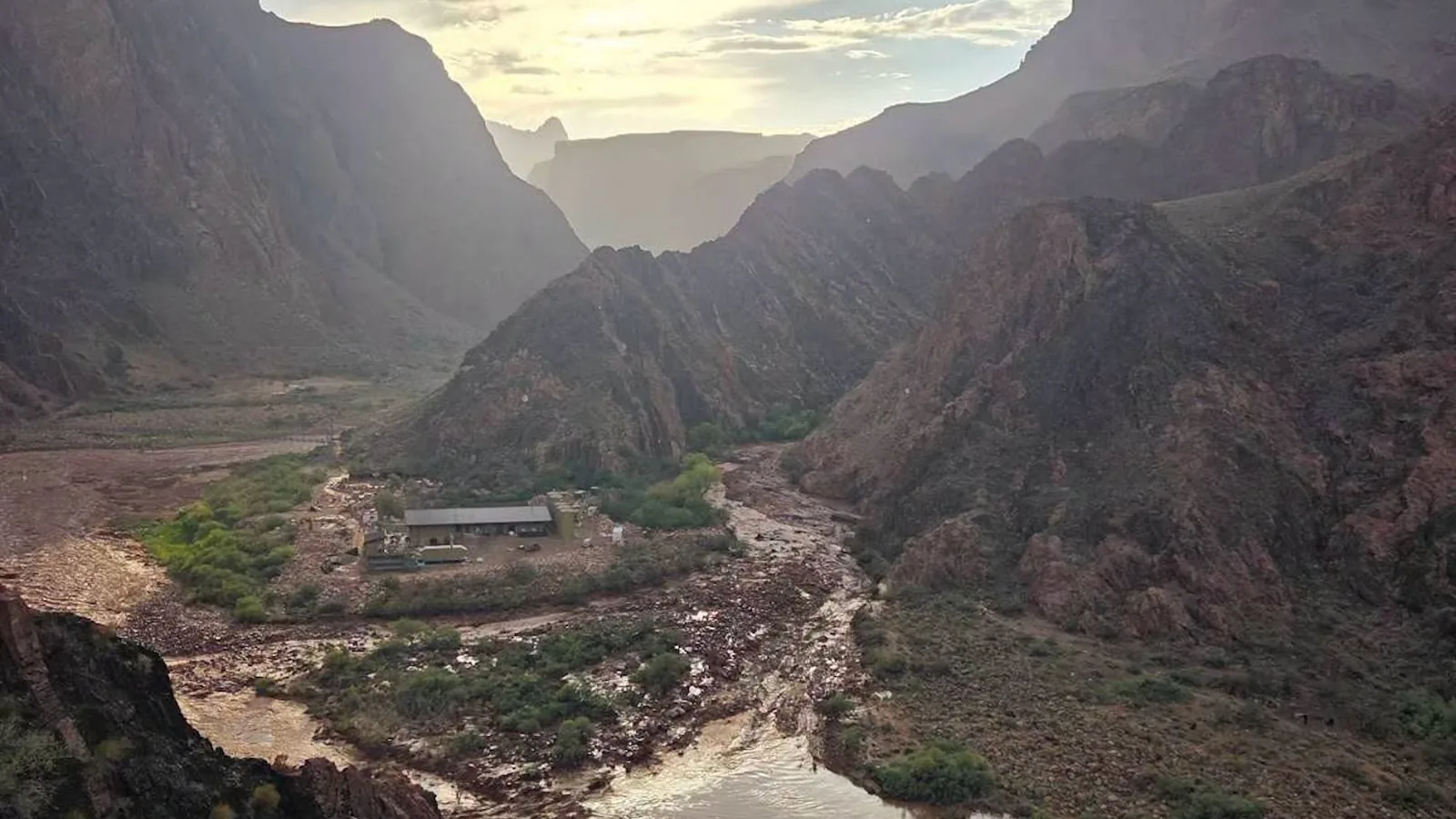 Rescue crews and evacuees move through flood damage at Grand Canyon National Park