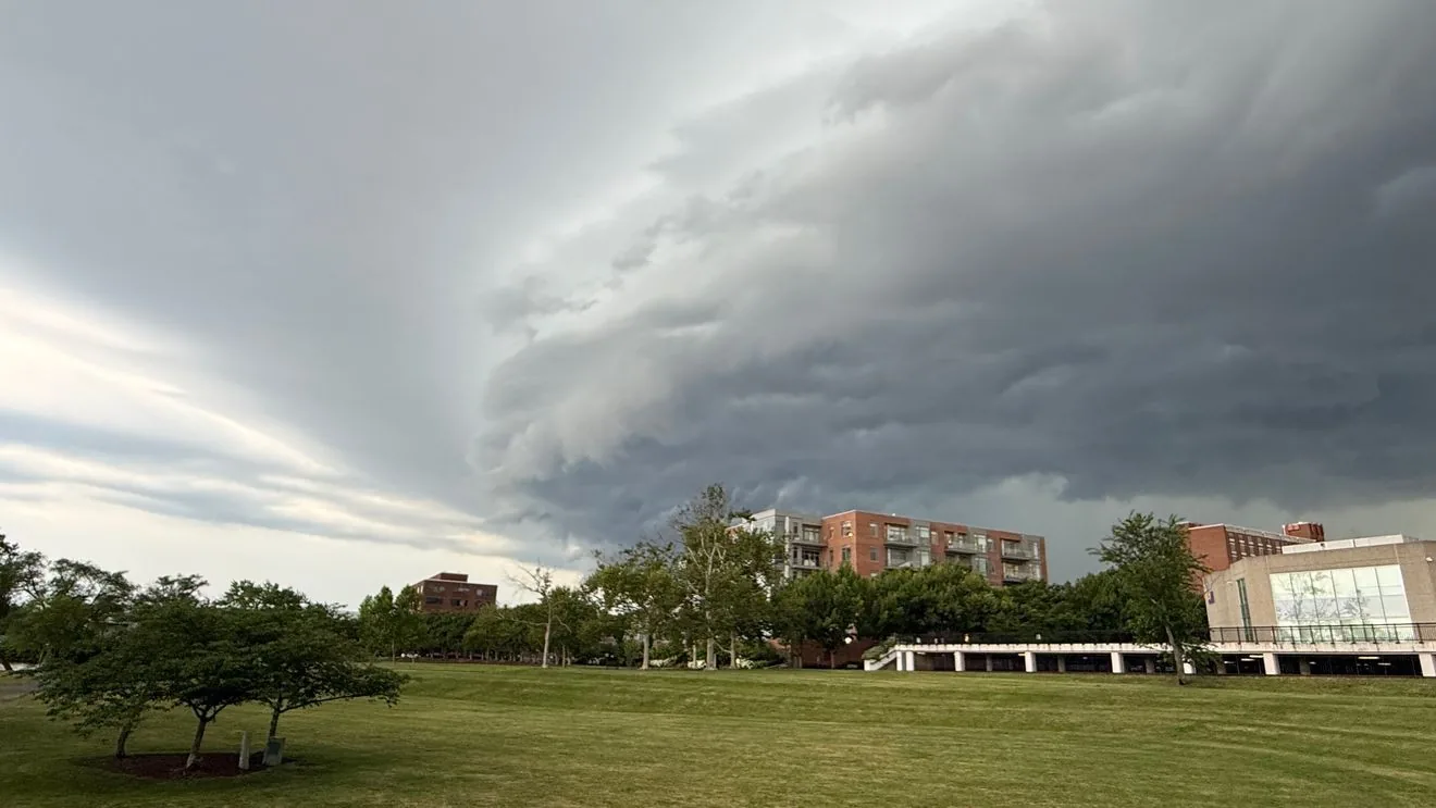 Dark storm clouds over a city skyline as severe thunderstorms threaten the region