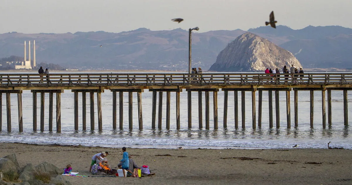 A military training jet flies over the ocean before ditching near the California coast