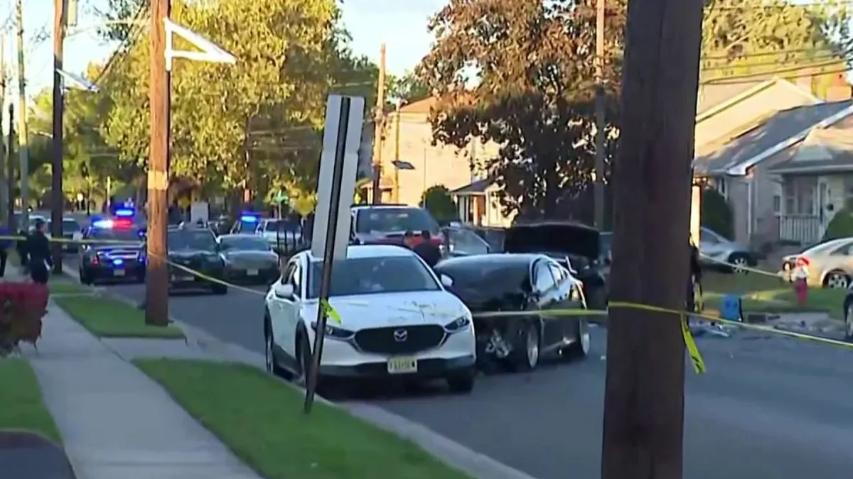 Damaged vehicles after a four-car crash on a New Jersey neighborhood street