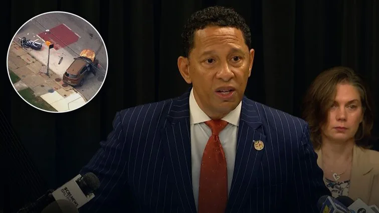 Baltimore prosecutor Ivan Bates speaks at a podium about a fatal stolen-car crash